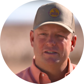 James Johnson is a 4th generation farmer and partner in W.R. Johnson and Sons LLC in Columbus, NM. W.R. Johnson and Sons is a diverse operation growing Upland and Pima cotton, paprika type chile peppers, onions, durum wheat, grain sorghum, pecans, pistachios, and grazing animals sheep and cattle. James attended Texas Tech University where he studied ag economics and horticulture before returning to the farm in 1995. In 1999 James took on the task of implementing subsurface drip irrigation on the farm to protect the deserts most precious resource of water. The farm now has moved into a regenerative agriculture approach, focusing on improved soil health, balanced fertility, and improved quality and yield of all products produced. James currently is the Chairman for Cotton Incorporated, and also serves as a member of the Mesa Farmers Cooperative Inc. and the New Mexico Cotton Growers association. James and his wife Kena have been married for 22 years, together they are raising the 5th and 6th generations on the farm, two sons(Taylor and Walker),daughter (Kalee) and granddaughter(Emery).