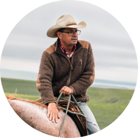 Zach Ducheneaux is a member of the Cheyenne River Sioux Tribe. He was the 3rd generation to manage the family beef cattle and Quarter Horse ranch. His professional career started as a farm advocate for the Intertribal Agriculture Council in the 90's and after a term on his Tribal Council, he continued to ranch and work with the Intertribal Agriculture Council, focusing on finance and producer economics. Ducheneaux served as your Farm Service Agency Administrator for the Biden Administration, focusing on finance, parity for livestock safety net programs, equity, and conservation. His work on finance reform continues through a company he created to demonstrate a better way to empower producers...5th C. Finance for producers should be an investment for the long term if we want long term results. Ag is profitable, Ag finance, when done to meet the needs of the producer is not risky. Paying for the use of money isn't the problem, paying back the money too fast is.
